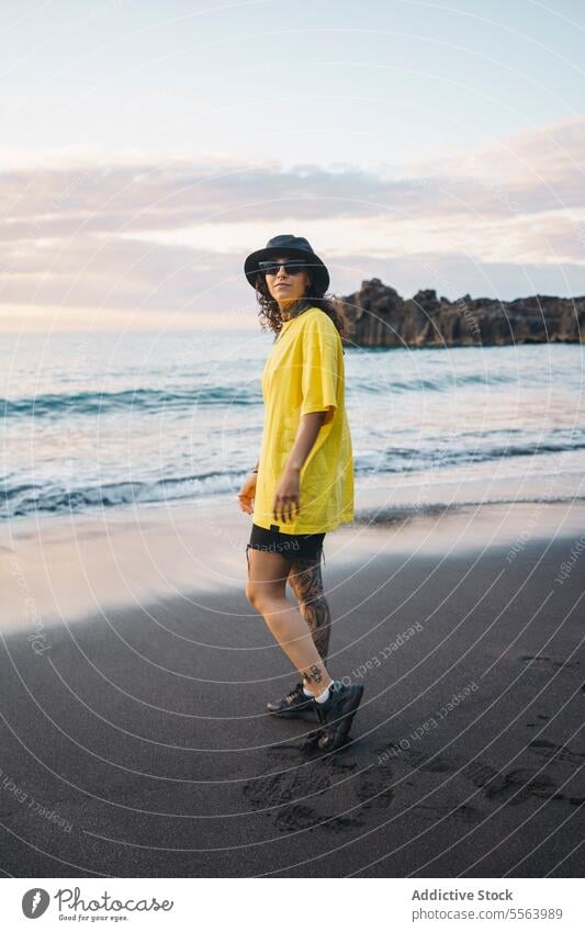 Pensive woman on beach sea pensive seashore ocean thoughtful calm coast female sand wave nature wind water Tenerife Canary Islands seaside rest young Spain