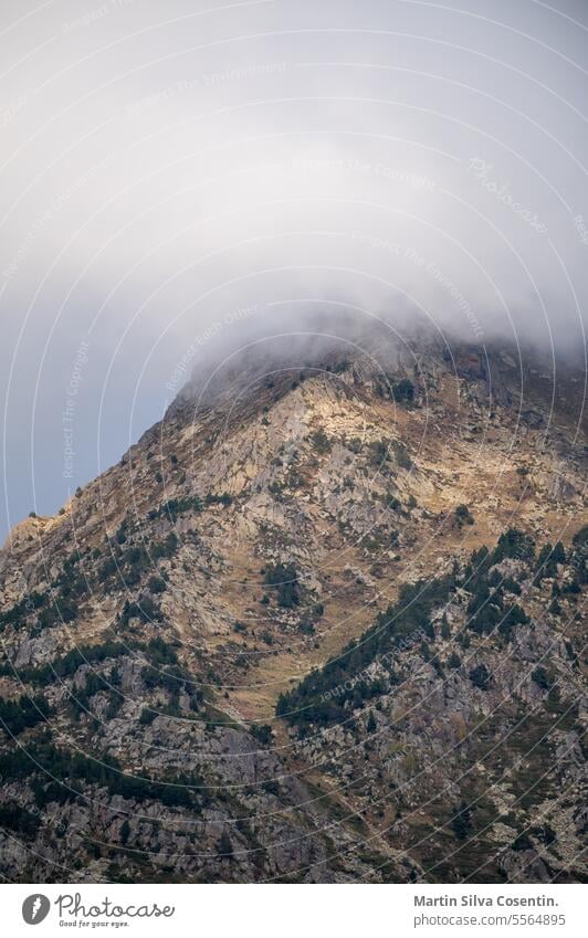 Mountain with fog in the Pyrenees in Andorra. adventure alpine alps asia background beautiful beauty blue china cloud dawn environment forest frozen glacier