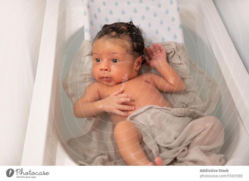 Little newborn baby having bath wash water child care love life childbirth kid childcare maternal motherhood infant babyhood hygiene healthy little childhood