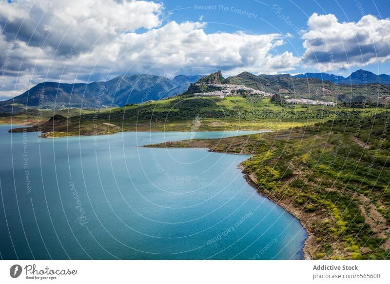 Picturesque view of village against mountain valley and lake in Zahara de la Sierra in Spain range scenery landscape environment nature settlement water river