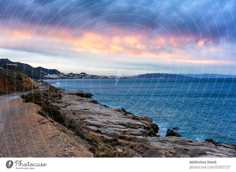 Sea coastal landscape with mountains in the background nature beach sea travel vacation water horizon horizontal panorama panoramic scenery copy space coastline