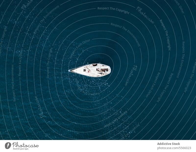 Motorboat floating in dark ocean motorboat trail speed sea marine nautical el rompido huelva spain seawater europe fishing summertime daylight journey surface