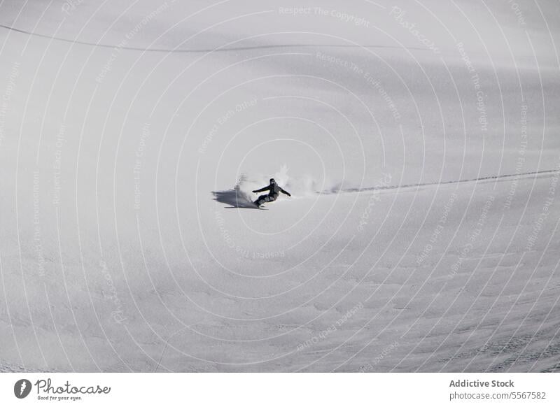 Person snowboarding on snow covered landscape during vacation person unrecognizable ski nature mountain equipment snowboarder full body sunny winter lifestyle