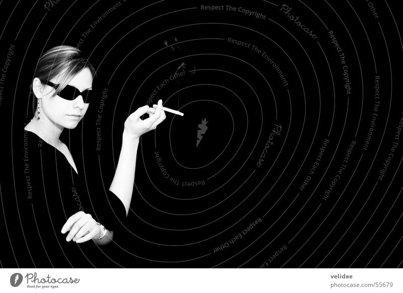 Tuxedo Lady Woman Arrogant Cigarette Chic Sunglasses Accessory Expensive Interior shot Portrait photograph Dark background Modern Black & white photo Elegant