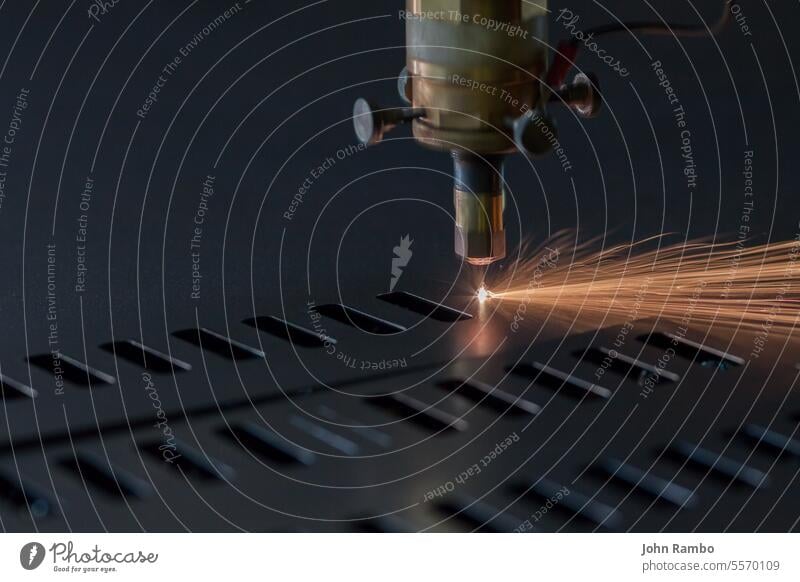 Process of industrial laser cutting of sheet metal engineering technology manufacturing steel machine industry processing machinery spark mechanical production