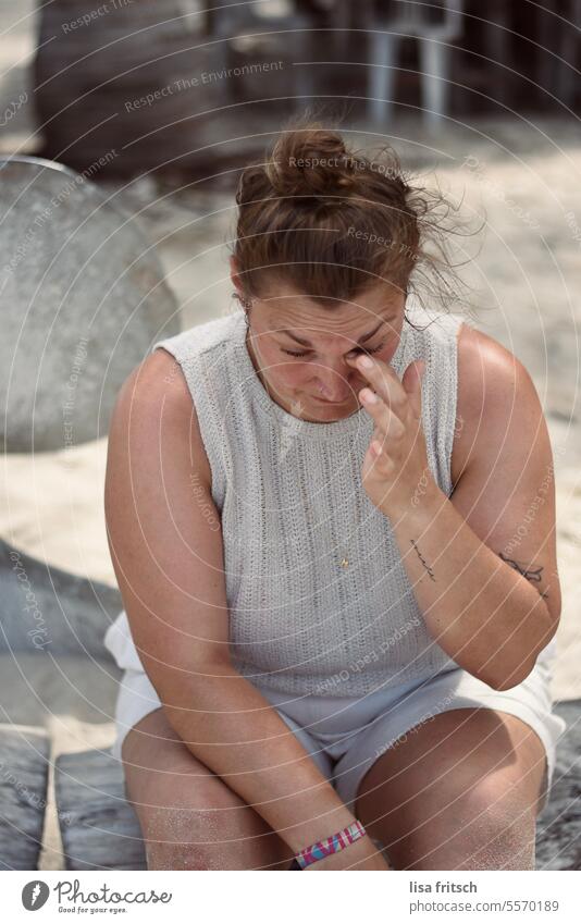 tired Woman 30 - 40 years Brunette Chignon Tourism Adults Vacation & Travel exhausted Exhaustion Summer Summer vacation Trip Beach Sit rest look down