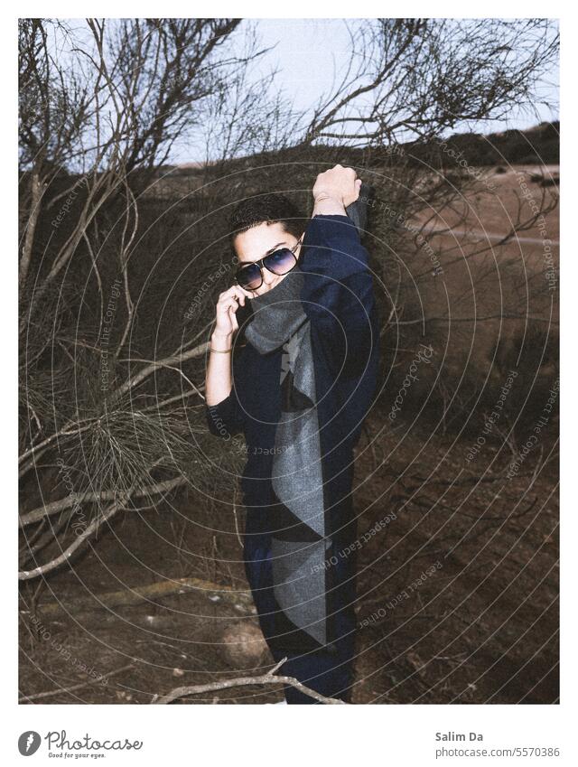 Stylish handsome young man. outdoor portrait captured in the wild nature Style stylish Sunglasses handsome people young adult Young woman handsome man