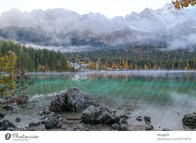 Mystical Eibsee Eib Lake Zugspitze Fog reflection Bavaria Zugspitze Massif Mountain Peak Snowcapped peak Autumn Zugspietzbahn Cable car tranquillity vacation