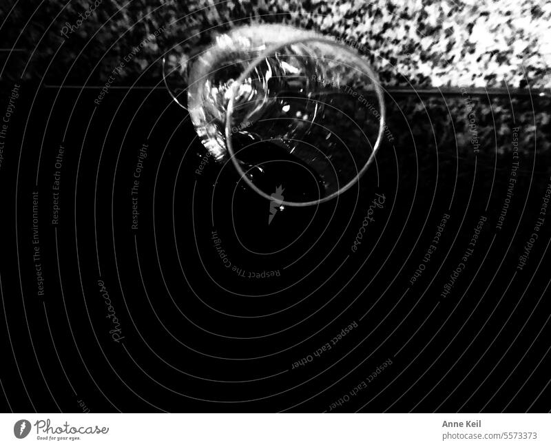 Cheers! Champagne glass overturned, black and white. Glass Sparkling wine Black & white photo Light Shadow Prosecco Alcoholic drinks Vine Interior shot Deserted