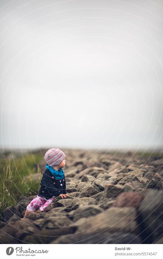 Child experiences nature - exploring the landscape Nature explore Curiosity Cute Observe Far-off places vacation Ocean Maritime coast