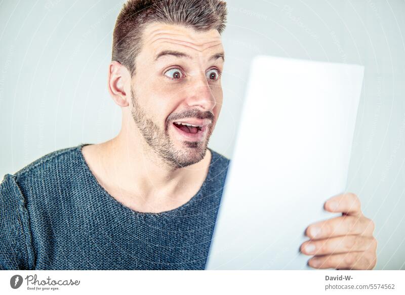 Man holds a piece of paper in his hands and smiles message Positive Communication Friends Facial expression Smiling Piece of paper Hand news Leaf Paper