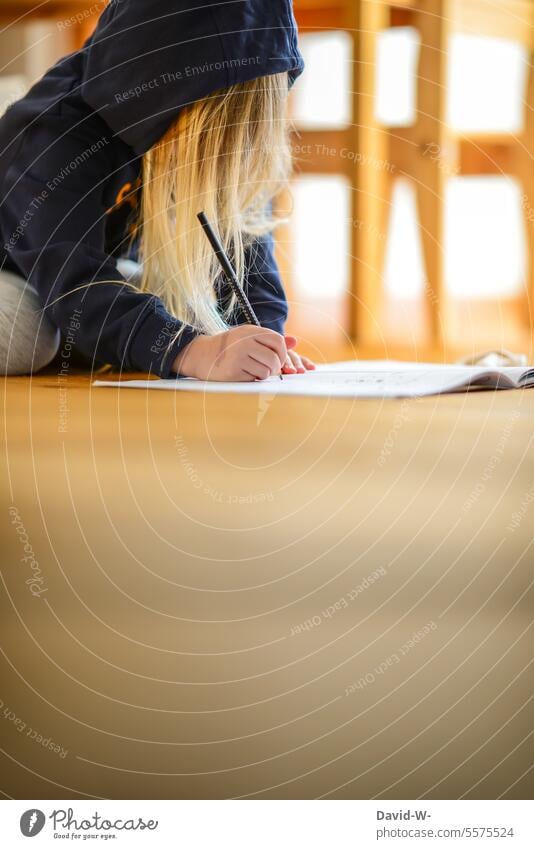 Child writes with a pen in a notebook Study Write Booklet Homework School Education Schoolchild Hand Anonymous Student Girl Concentrate Know Infancy