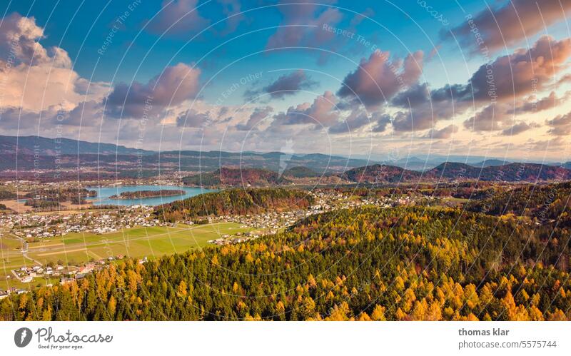 Faakersee in Carinthia Lake Faaker Calm Sunset Landscape Nature Water Sky Sunlight Lakeside Exterior shot Environment Beautiful weather Light Idyll Relaxation