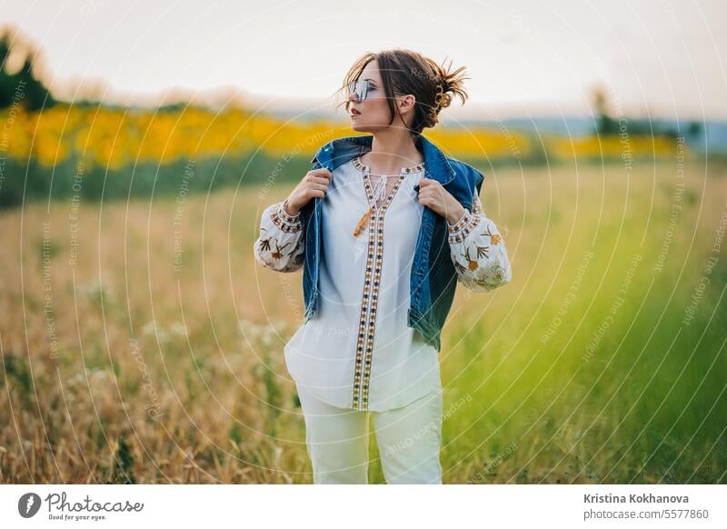 Attractive ukrainian woman on nature background. Ethno style, embroidery shirt happy young beautiful beauty female girl person stylish portrait caucasian hair