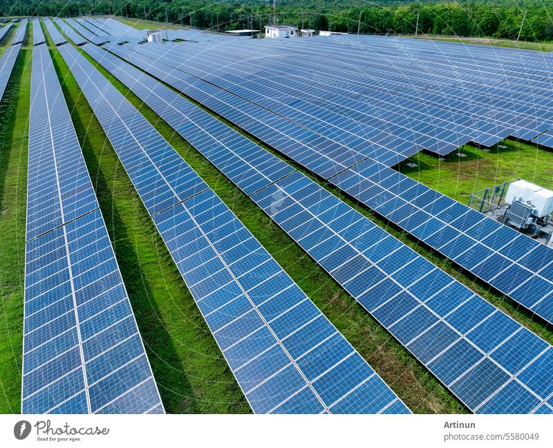 Aerial view of solar farm. Solar power for green energy. Sustainable resources. Solar cell panels use sun light as a source to generate electricity. Photovoltaics or PV. Sustainable renewable energy.