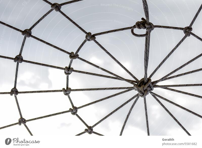 many ropes and one big knot close up abstract abstract background affiliation apposition attachment black cable close-up combination communications compound