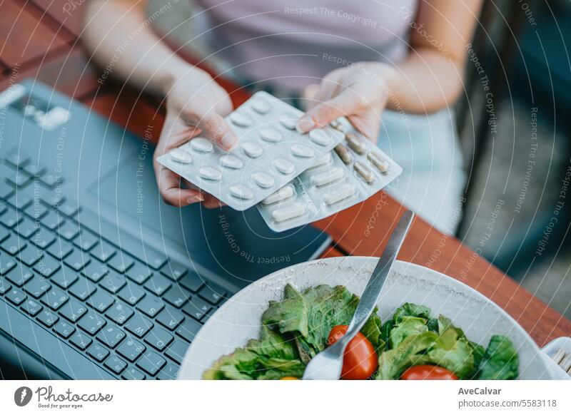 Close up hands taking pills from pill case, supplementing or vitamin medication,disease treatment concept woman happy painkiller healthy gadget workplace