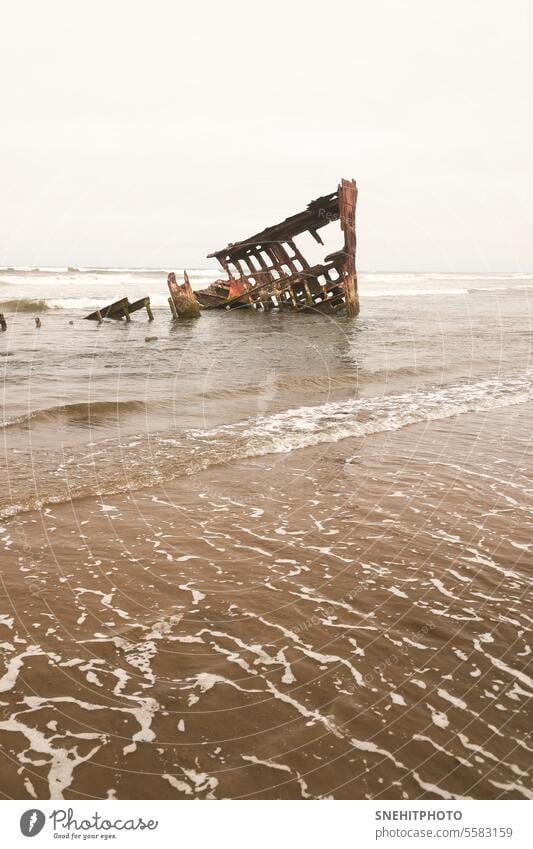 Wreck of the Peter Iredale along pacific coast in Oregon. abandoned aged beach boat coastline columbia river fort stevens fort stevens state park ghost ship