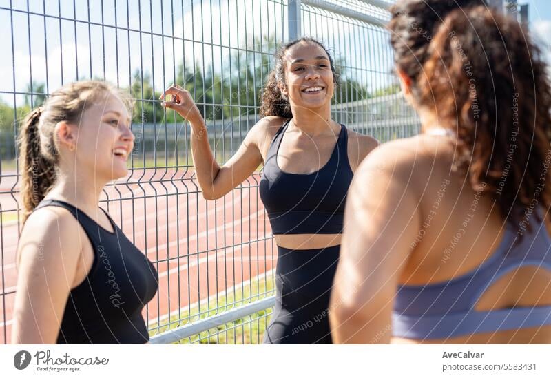 Diverse group of friends training together during sunny day.Body positive all shapes are valid. fitness female young healthy person active lifestyle sports