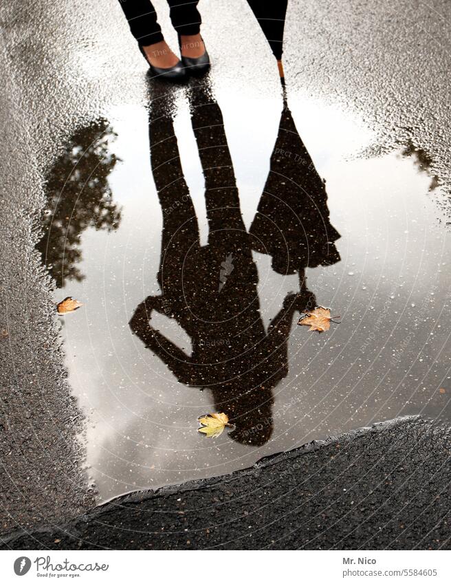 rain break Weather Puddle Reflection Shadow Silhouette Water Autumn leaves Rainwater Seasons Wet Stand Lanes & trails Umbrella Footwear Street Bad weather