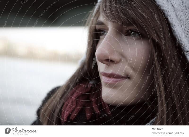 woman Feminine portrait Face Upper body Cap Hair and hairstyles pretty Lifestyle chill Cold Woolen hat Lips Head Curiosity Looking Self-confident melancholy