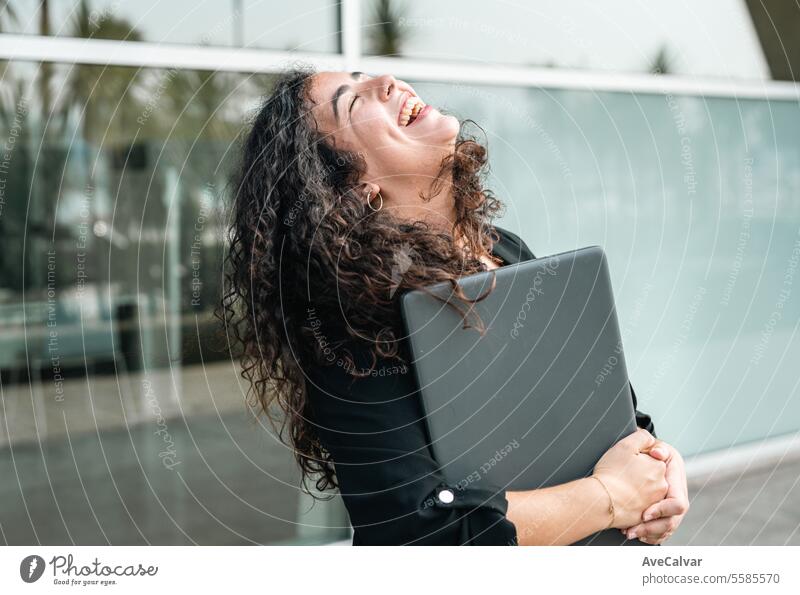 Smiling young hispanic business woman leader entrepreneur, professional manager smiling on street outdoors colleague person female women adult businesswoman