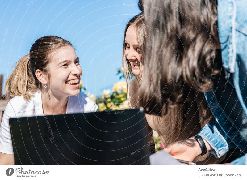 Women giving support and helping each other revising together for university exams and tests. group students studying bonding laughing conversation friends