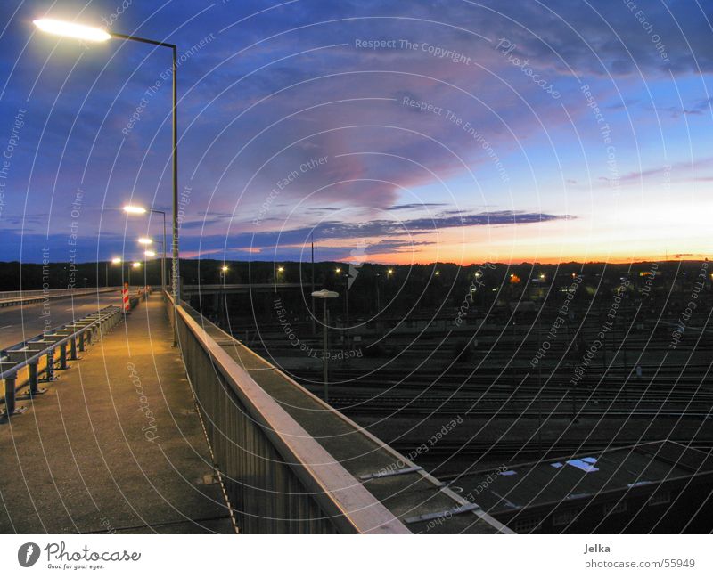 marshalling yard Sky Train station Bridge Railroad tracks Gloomy Switchyard Sunset Lantern Hamburg Handrail Colour photo Street lighting Deserted Illuminate