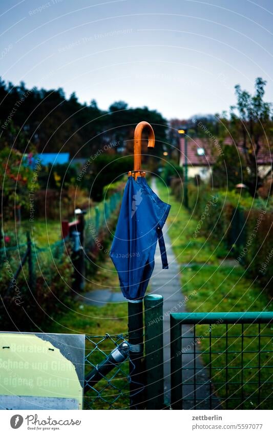 umbrella Evening Dark Twilight Relaxation awakening holidays Garden Hedge Sky allotment Garden allotments Deserted neighbourhood Nature Plant tranquillity