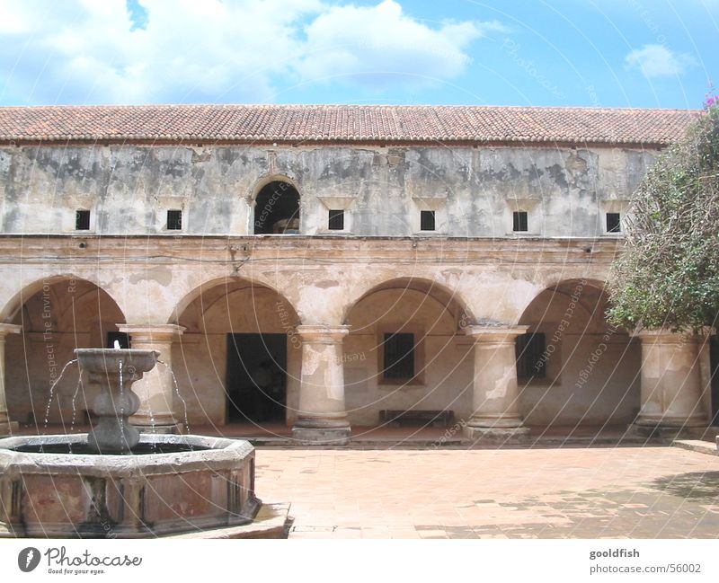 convent Colonial style Wall (barrier) Well Ruin Window Green Tree Monastery Blue sky old masonry Old Water Spain Antigua Door Architecture