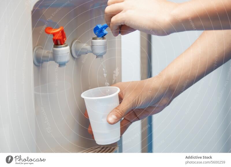 Drinking purified water Water drink plastic cap healthy eating lifestyle healthcare potable water cooler tap red blue drinking fountain machinery modern