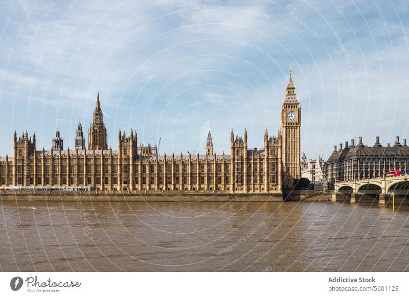 Iconic view of the Houses of Parliament and Big Ben in London london big ben houses of parliament thames river landmark architecture historic iconic england