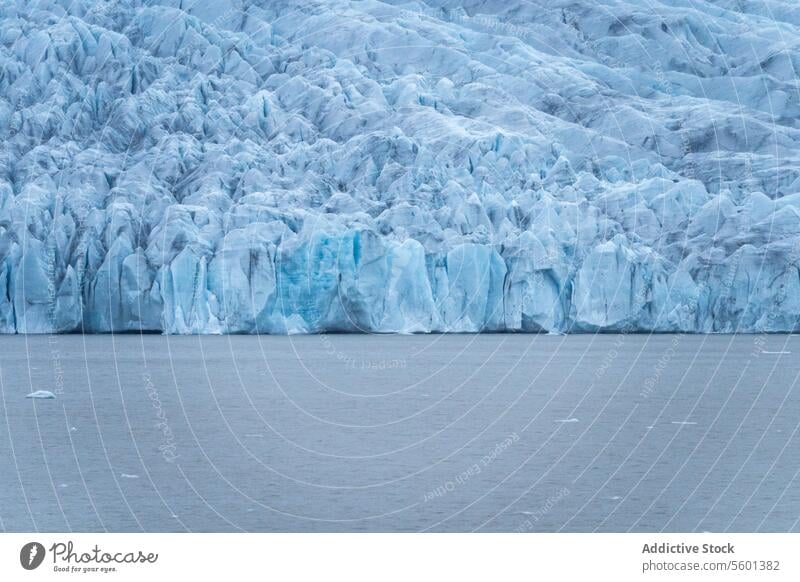 Icy blue glacier formations in Vatnajökull, Iceland iceland vatnajökull national park natural beauty cold icebergs water frozen arctic scenery landscape