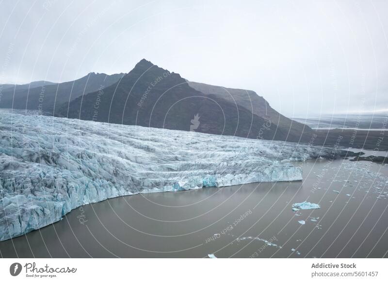 Serene Glacier Reflection in Vatnajökull, Iceland glacier reflection water vatnajökull iceland serene tranquil blue soft-lit sky nature park landscape cold