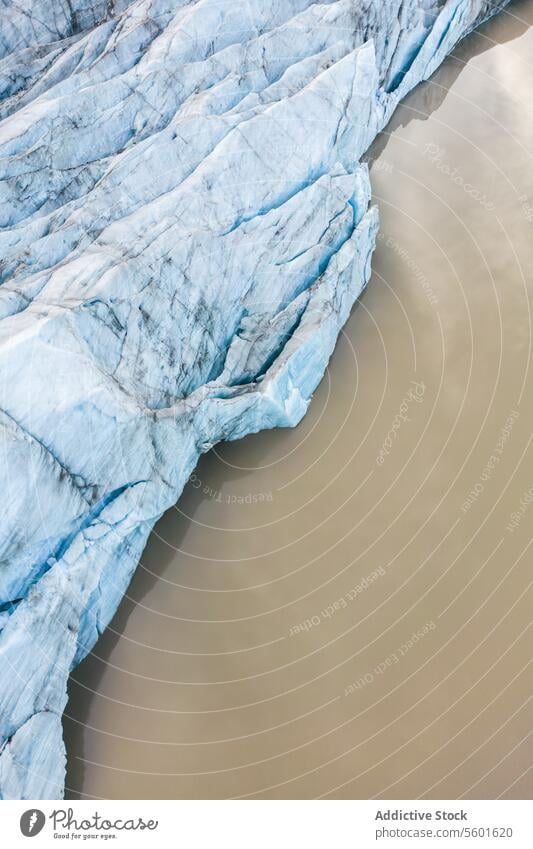 Aerial view of ice cap and sea with icebergs glacier aerial landscape winter weather nature scenic arctic cold water seaside vatnajokull iceland texture