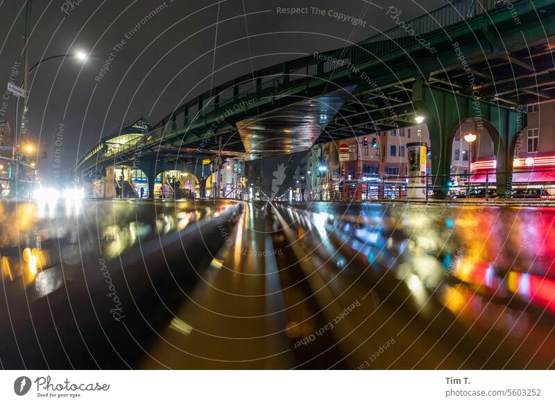 Lights are reflected on the streetcar tracks Prenzlauer Berg Night Winter Colour photo Schönhauser Allee chestnut avenue Railroad tracks Mono rail Berlin