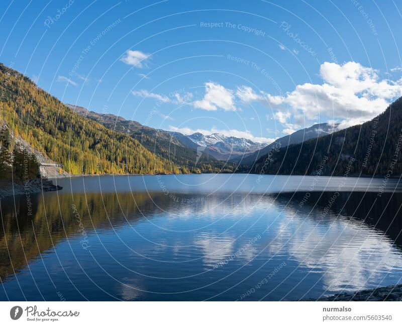 The vast high mountains, lakes. Alps mountain lake Sky Clouds Switzerland reflection Snow top height Pass Far-off places Frozen water Blue slope