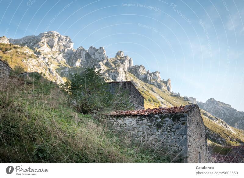 Mountain landscape with old stone houses Day Summer daylight Beautiful weather Nature Environment Rock Sky mountains Peak Landscape Clouds Vacation & Travel