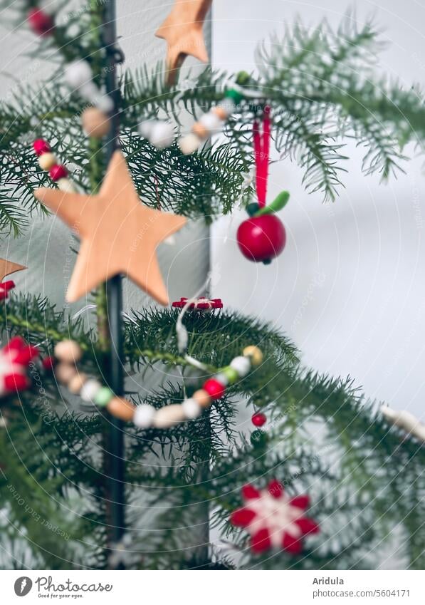 Decorated small indoor fir tree in front of the cupboard corner Room fir Christmas tree Christmas & Advent Christmas decoration Christmassy