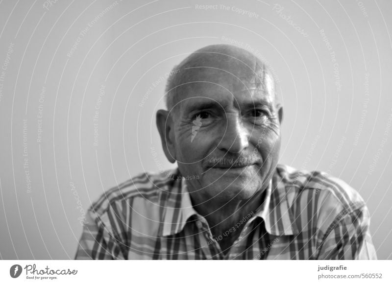 A young at heart senior looks friendly into the camera. Eighty. Human being Masculine Man Adults Male senior Senior citizen Life Head Face 1 60 years and older