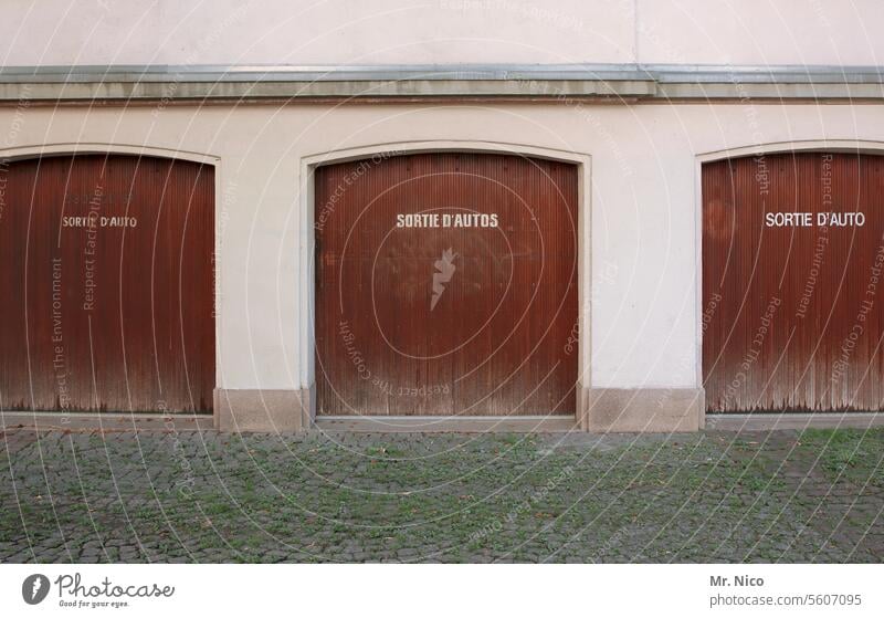 in France Signage Characters House (Residential Structure) Garage sign Signs and labeling French Building Typography Side by side Facade Architecture