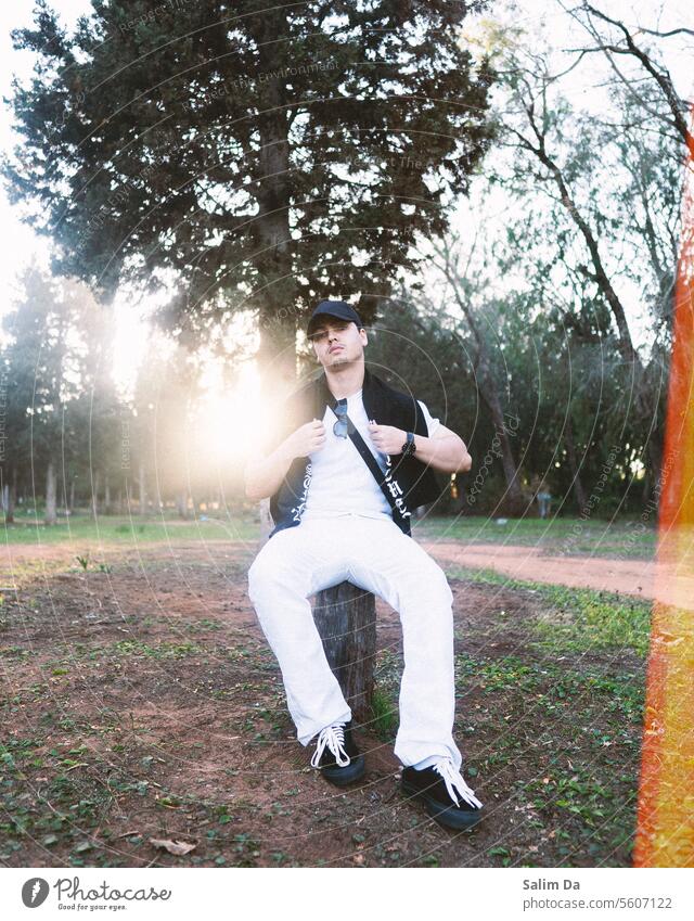 Stylish guy in a cool black and white outfit against the lovely sun rays Nature Natural naturally Forest Forestry forests natural world natural light handsome