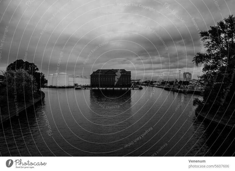 Industrial site at the water in Berlin,black and white Capital city sky clouds house houses windows tree trees autumn Water River Industrial Premises