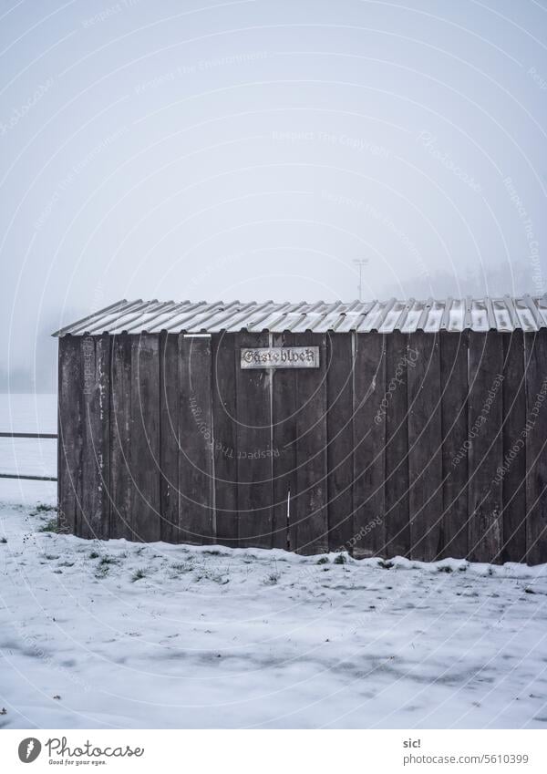 Guest block . Wooden stand on the edge of the pitch Foot ball Football pitch Sports Sporting Complex Deserted Colour photo Exterior shot Stadium Fog