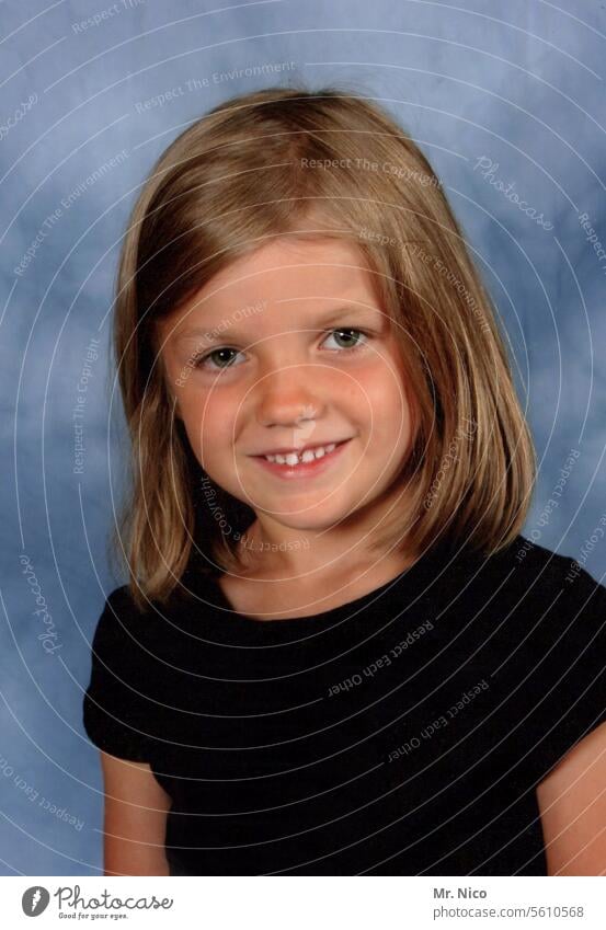 the school photographer was there Girl Infancy youthful Child Contentment Smiling Grinning Impish portrait Face Brash Hair and hairstyles Schoolchild