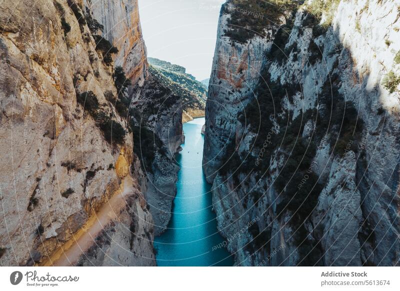 Breathtaking view of majestic mountains with blue river nature rocky water flow picturesque scenery calm narrow rough cliff breathtaking sky scenic spectacular