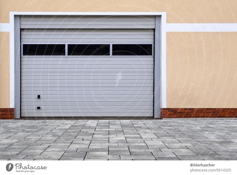 Large roller garage door with window Garage door garage entrance Highway ramp (exit) Highway ramp (entrance) Entrance Main gate Front door Colour surface free