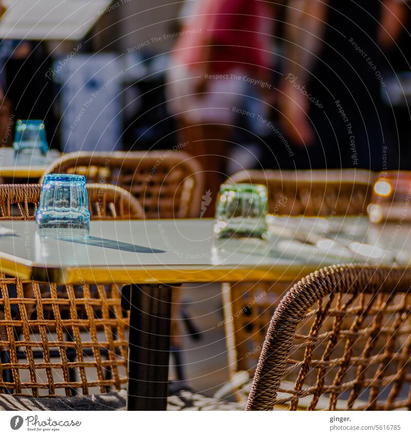 Outside in the restaurant - table with chairs and colorful glasses Table Chair Exterior shot Café Sidewalk café Empty Restaurant Seating Gastronomy Tourism