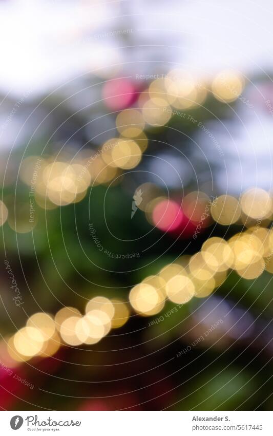 Bokeh of a Christmas tree detail with fairy lights and red Christmas tree baubles Christmas & Advent Christmas decoration fir tree Decoration