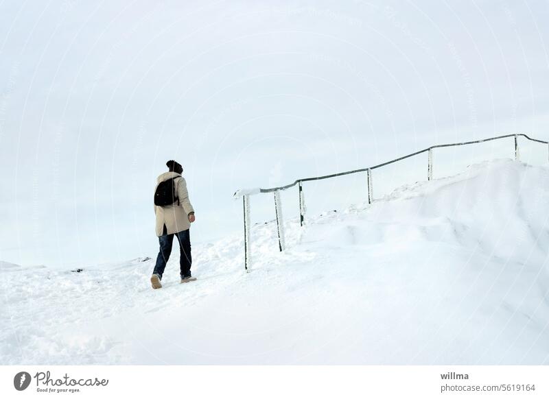 Summit climbers want to hike in the snow Winter Snow uphill mountain snow-covered Human being Cap Backpack Cold Hiking rail Trip Erz Mountains shepherd's stone